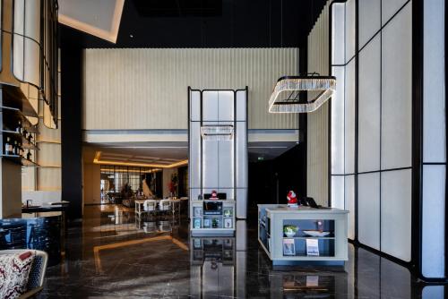 Cuisine ou kitchenette dans l'établissement UrCove By Hyatt Guangzhou Baiyun Airport Free Shuttle Bus to Canton Fair and to Airport