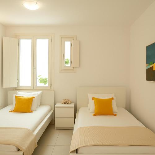 Ένα ή περισσότερα κρεβάτια σε δωμάτιο στο Mykonos Villa Sympatico, Private Pool & Sea Vistas