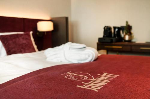 Postel nebo postele na pokoji v ubytování Hotel Jakobwirt Westendorf