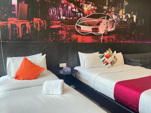 Un ou plusieurs lits dans un hébergement de l'établissement Ceylonz Suites KLCC By KL Tower