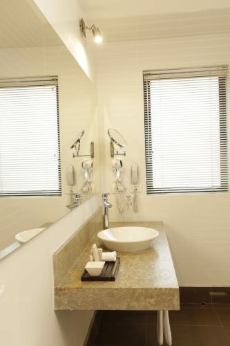 Koupelna v ubytování Hotel bh La Quinta