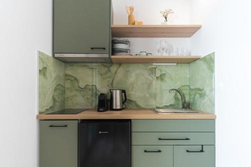 Una cocina o cocineta en Lelis Studios