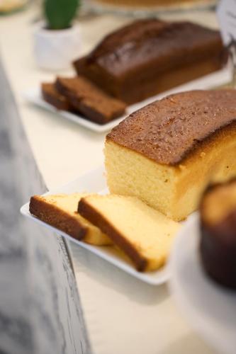a plate with different types of cake on a table at Boutique Hotel San Giovanni in San Giovanni in Persiceto
