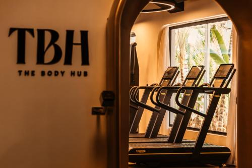 a row of chairs in a room with a mirror at Ushuaïa Ibiza Beach Hotel - Adults Only - Club Entrance Included in Playa d'en Bossa