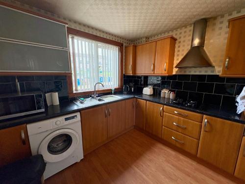Η κουζίνα ή μικρή κουζίνα στο Apartment in Inverness