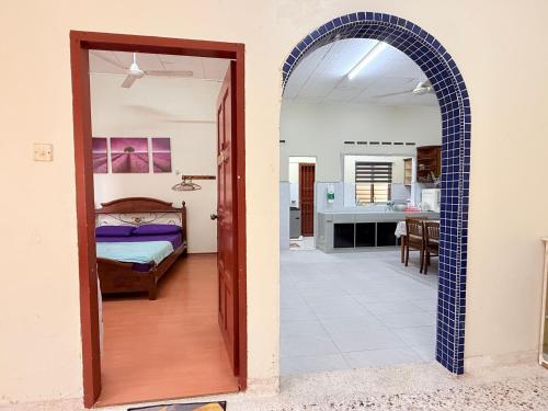 Ένα ή περισσότερα κρεβάτια σε δωμάτιο στο Bella Homestay Budget Ayer Keroh - 4 Bedrooms, 15 minutes to town