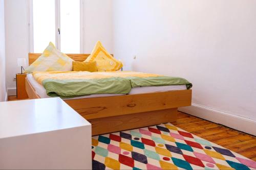 Ένα ή περισσότερα κρεβάτια σε δωμάτιο στο Wohnung mitten im Weinparadies