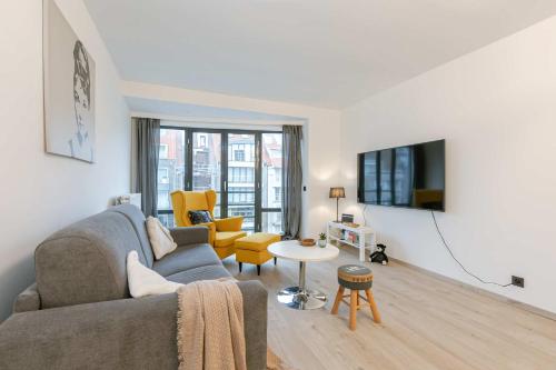 TV a/nebo společenská místnost v ubytování Huswell - Cosy apartment in the centre of Knokke
