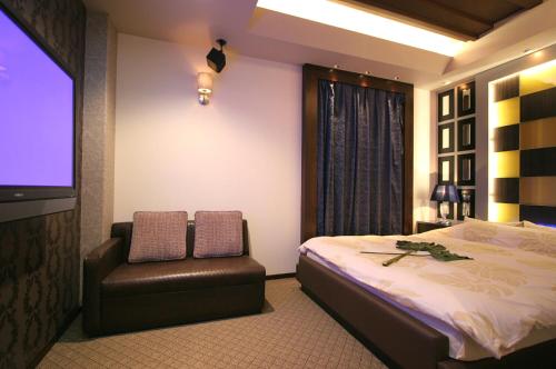 Postel nebo postele na pokoji v ubytování Hotel NEX check in 13時から
