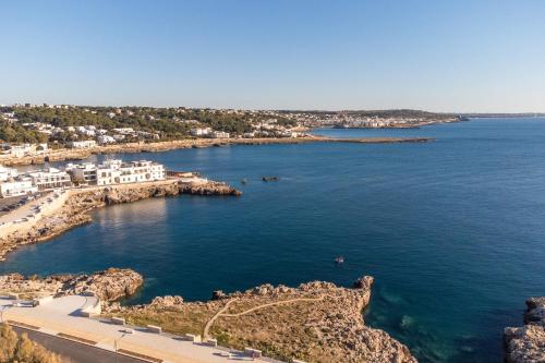 an aerial view of a large body of water at Biancolino Apartments in Nardò