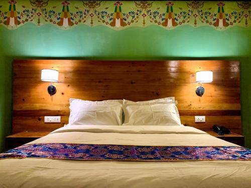 Letto o letti in una camera di Dzi Pema