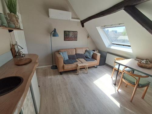 Χώρος καθιστικού στο B&B De Tabaksschuur