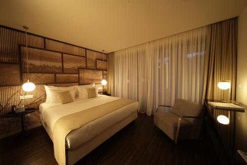 Cama o camas de una habitación en Azur Hotel