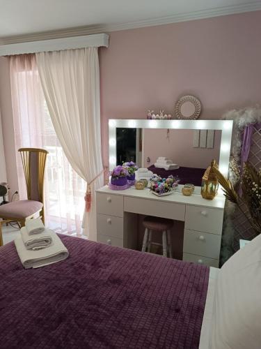 Ένα ή περισσότερα κρεβάτια σε δωμάτιο στο DreamHouse