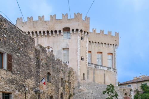 an old building with a castle at Grimaldi in Cagnes-sur-Mer