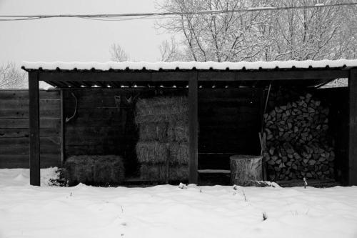 a wooden shed with snow on top of it at Cà Bossi Retreat above Lake Como in Cernobbio