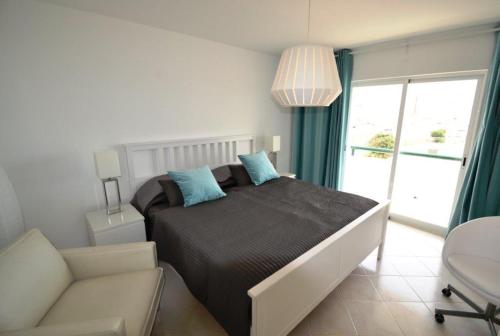 Ένα ή περισσότερα κρεβάτια σε δωμάτιο στο Nautilus Apartment