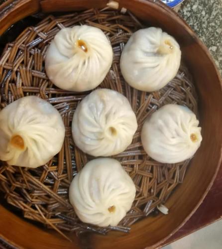 a group of white food in a bowl at Jinglai Hotel Changshou Road Subway Station Branch in Shanghai