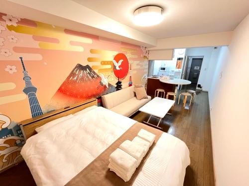 Postel nebo postele na pokoji v ubytování Camelot Annex