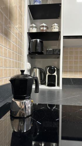 a coffee pot sitting on a counter in a kitchen at Balcón del Júcar delux in Tragacete