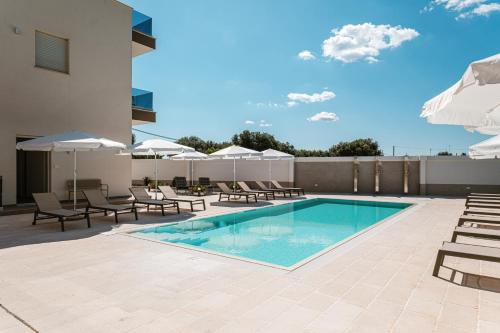 Πισίνα στο ή κοντά στο Eleia Domos Homes