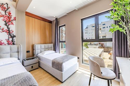 Postel nebo postele na pokoji v ubytování Verona Boutique Hotel