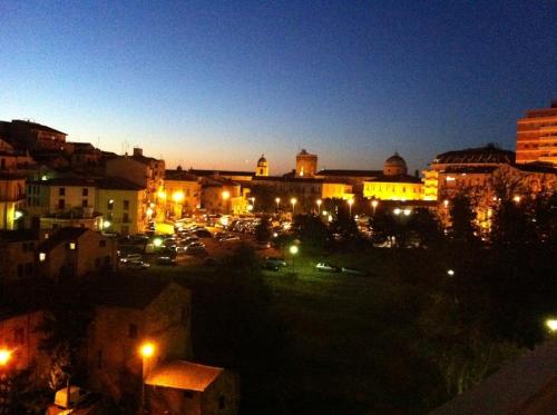 a view of a city at night with lights at Albergo Roma in Lanciano