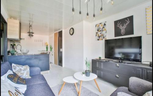 Et tv og/eller underholdning på Havre de paix moderne et central