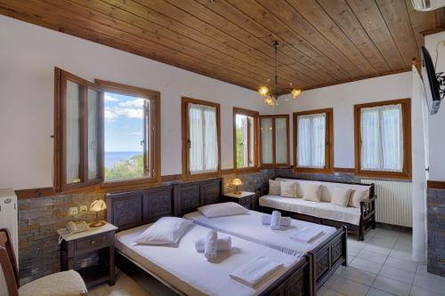 Postel nebo postele na pokoji v ubytování Hotel Agnadi - Horefto