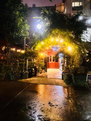 a building with a bunch of lights at night at Homestay Sunny in Thái Nguyên