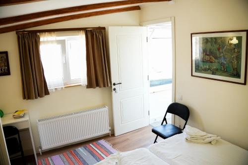 Communa Guesthouseにあるベッド