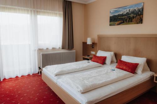 Postel nebo postele na pokoji v ubytování Pension Spreitzhof & Appartement Royer