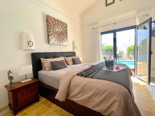 Villa Casa Karoline with a sunny terrace, heated pool, comfort and privacy in a quiet neighborhood