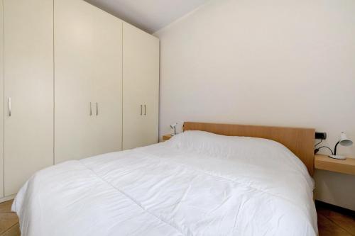 Cama o camas de una habitación en Bifamiliare a due passi dal Lago