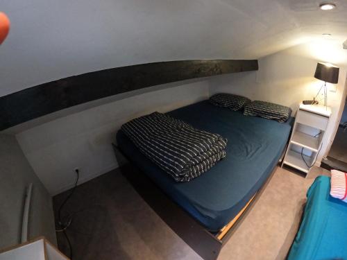 Postel nebo postele na pokoji v ubytování Chambre 4 personnes 2 lits proche métro 5