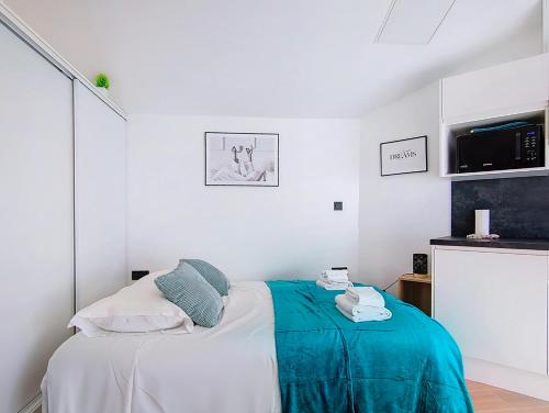 Postel nebo postele na pokoji v ubytování Bel appartement central - Sweet Home