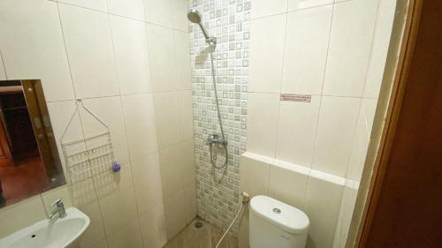 Ένα μπάνιο στο Oemah Yobo Guesthouse