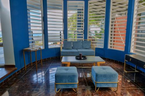 Posezení v ubytování Hôtel Villa Les Orchidées