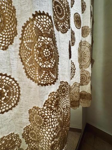 a quilt is hanging on a wall at La Presentosa b&b in Fossacesia