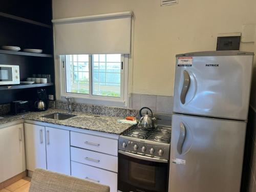 Dapur atau dapur kecil di Dos Mareas Apart Piscina Climatizada Cubierta