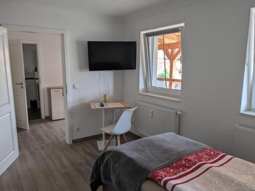 TV a/nebo společenská místnost v ubytování Haus No. 5A