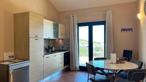 Η κουζίνα ή μικρή κουζίνα στο Agriturismo Azzurra Biricchina