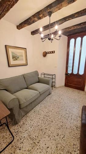 a living room with a couch and a table at Antonio's home in Colonno