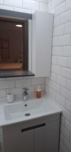Koupelna v ubytování Sabor Residence