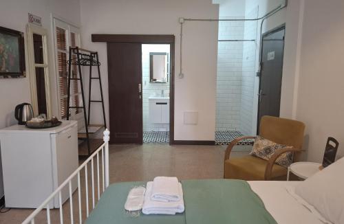 Postel nebo postele na pokoji v ubytování Sabor Residence