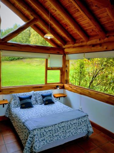 Llit o llits en una habitació de Blue Bird House