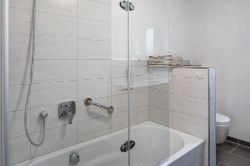 Ένα μπάνιο στο Ferienwohnung Sonnenseite
