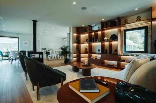 a living room with a couch and a table at Quinta S Pedro - Arouca Valley in Arouca