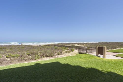 a view of the beach from the balcony of a house at Sea Vista in South Padre Island