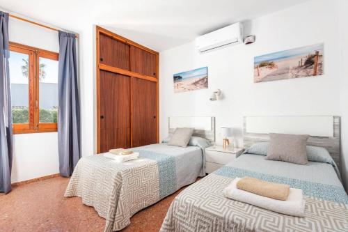 Postel nebo postele na pokoji v ubytování Villa Crisanna by Villa Plus